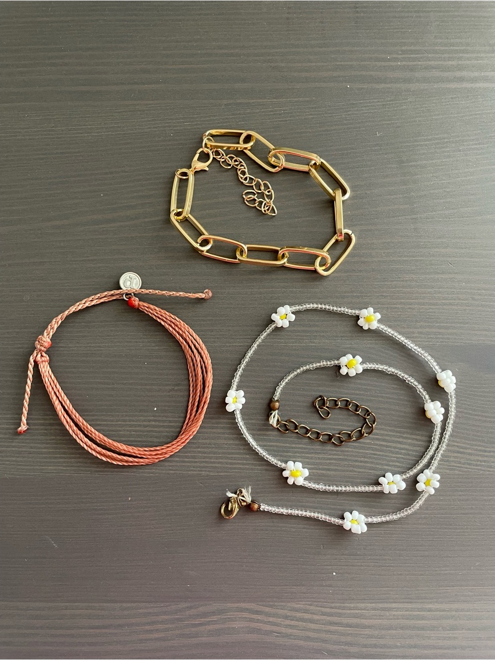 Jewelry Set
Gold Link Bracelet, Coral Cord Bracelet & WhiteDaisy Beaded Necklace